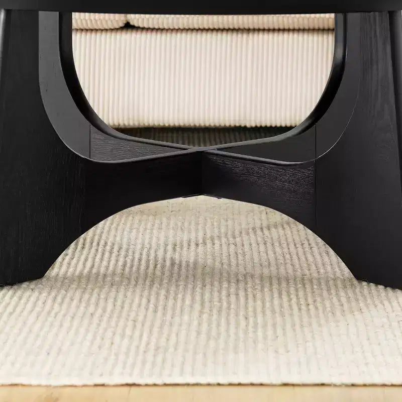 Mesa de centro redonda moderna de madera con patas cruzadas