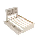 Estructura de cama matrimonial moderna de 87 pulgadas con cabecera de dos niveles estilo librero, puertos USB integrados y dos cajones. Acabado blanqueado